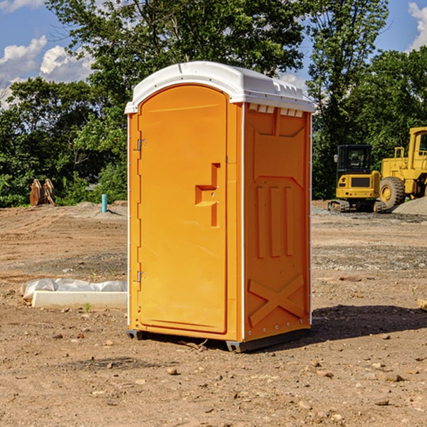 how often are the porta potties cleaned and serviced during a rental period in Mitchell